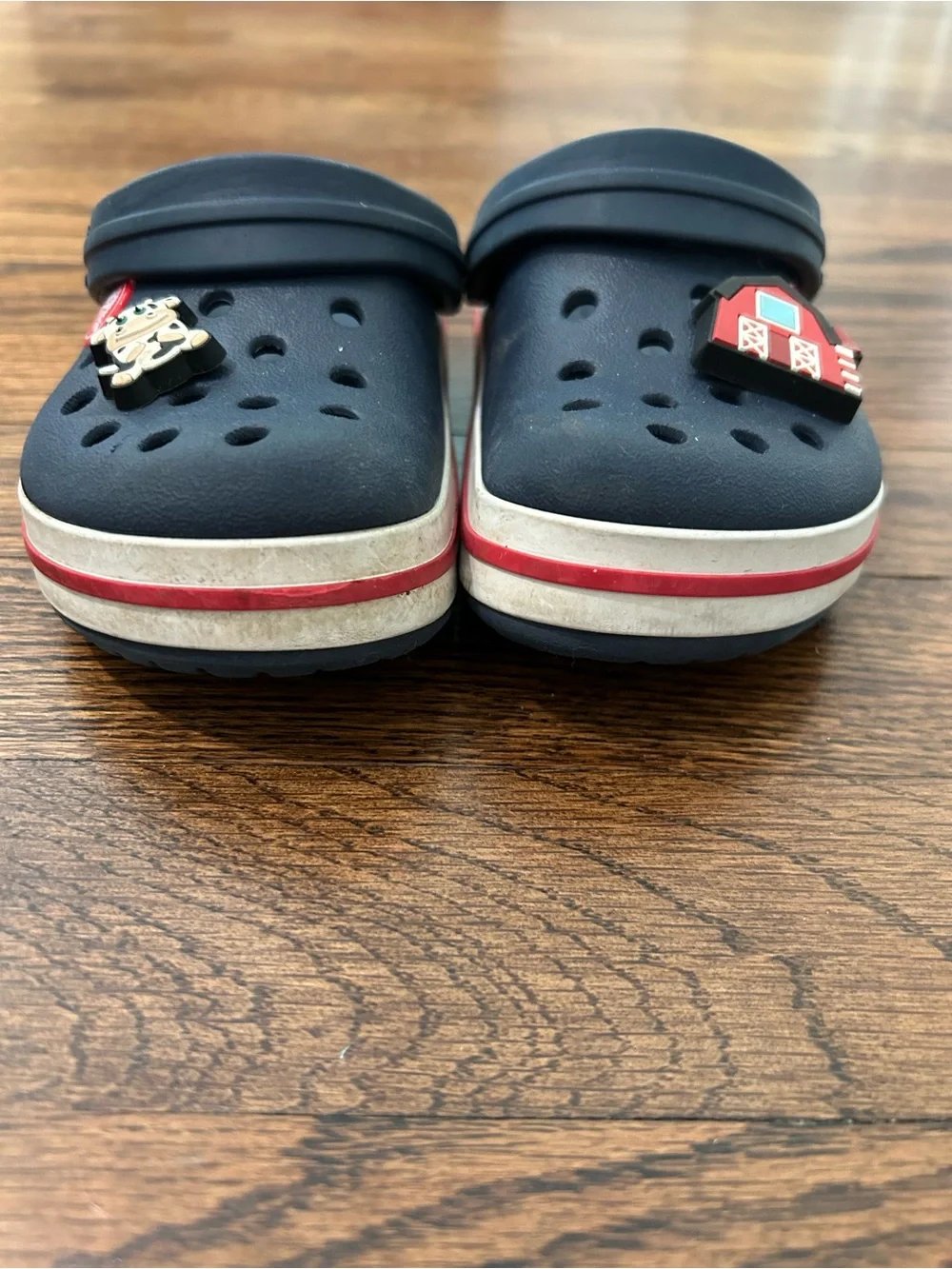 CROCS Kids SIZE 10 Navy Slip-On Clogs with Red Trim and Farm Charms